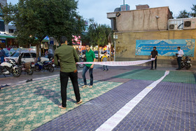 آماده سازی پیاده روی خیابان شهدا قم برای توزیع افطاری
