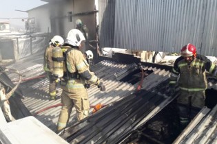 آتش سوزی در یک پاساژ تجاری بازار تهران
