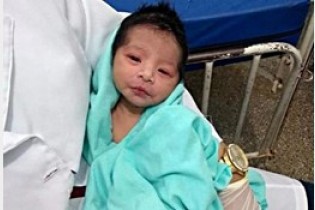 نوزاد زنده به گور نجات یافت