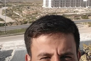 تصاویر سلفی تروریست خندان با ویرانه حلب