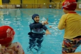 اجبار دختران محجبه درآلمان به شنای مختلط