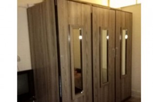 فیلمبرداری از زنان در اتاق پرو فروشگاهی در شهرک غرب تهران