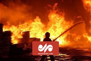 آتش سوزی در نمایشگاه خودروهای سنگین در تبریز